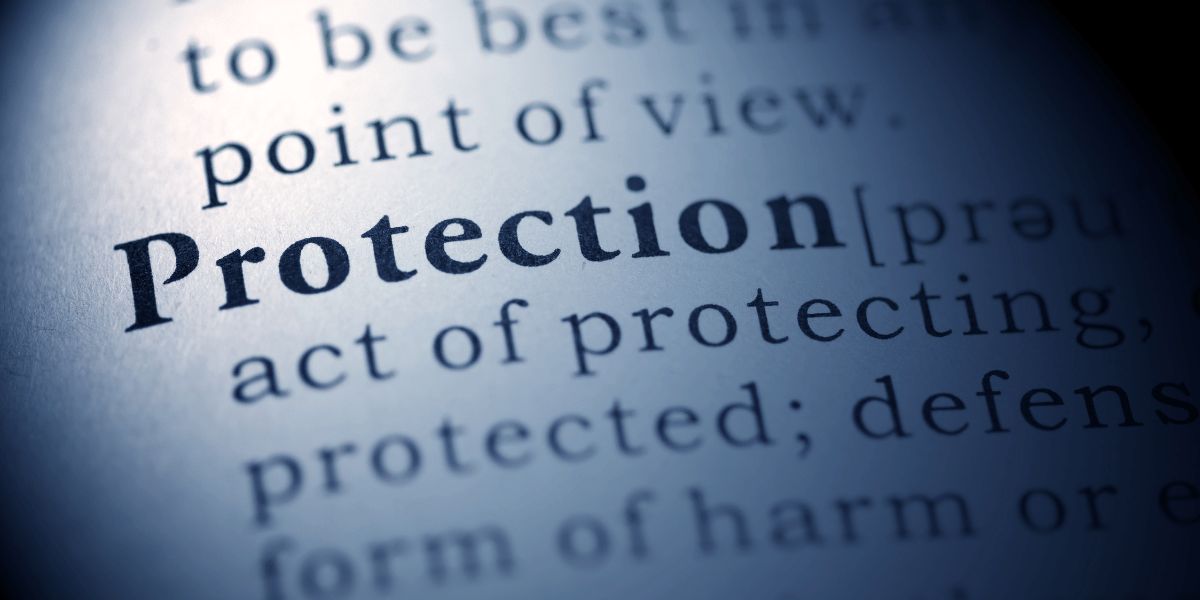Dictionary opened to the definition of protection